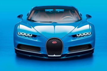 Vista delantera del Bugatti Chiron destacando su icónica parrilla y faros LED.
