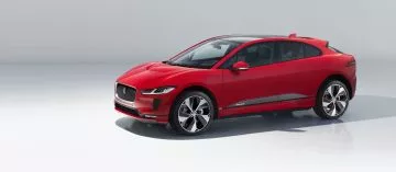 Vista lateral Jaguar I-PACE en un tono rojo vibrante.