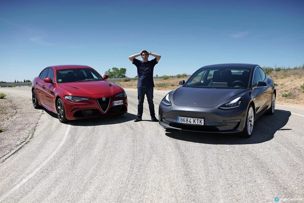 Tesla Model 3 Vs Alfa Romeo Giulia Quadrifoglio 0619 033 