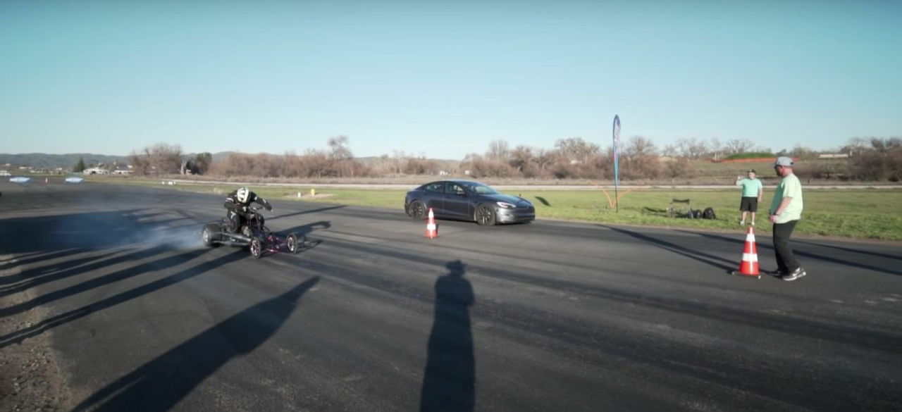 Quad Vs Tesla Model S