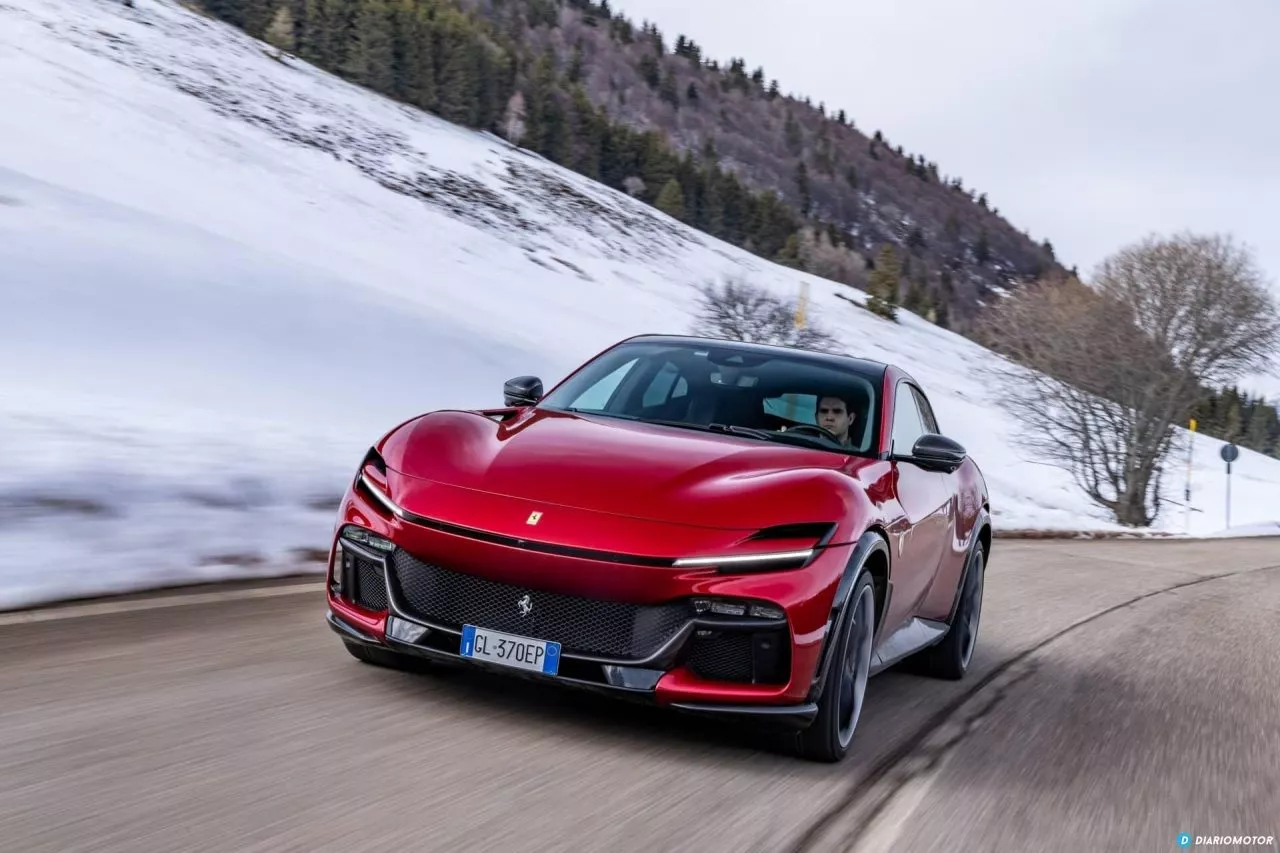 Ferrari Purosangue conquistando la carretera invernal, elegancia y potencia.