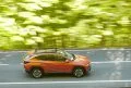 Vista dinámica lateral del Hyundai Tucson 2024 en movimiento