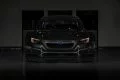 Visión frontal agresiva del Subaru WRX STI Project Midnight, resaltando su diseño enfocado en la performance.
