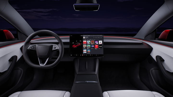 Vista delantera del habitáculo del Tesla Model 3 destacando su diseño minimalista.