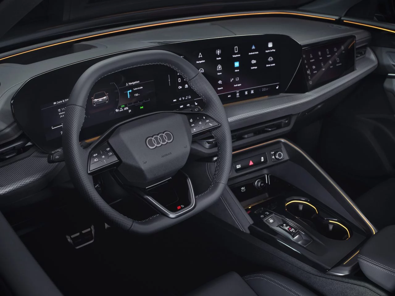 Habitáculo del nuevo Audi Q5 2025 mostrando la elegancia y tecnología en su volante y panel de instrumentos.