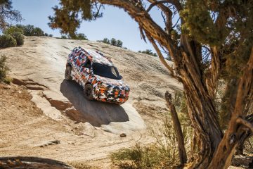 Honda Passport Trailsport enfrentándose a terreno rugoso, demostrando su capacidad offroad.