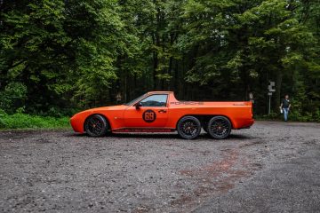 Vision de un Porsche pickup 6x6 con diseño lateral inconfundible