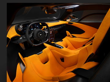 Vista del lujoso interior del McLaren W1 con asientos deportivos.