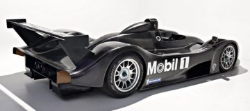 Vista lateral Porsche LMP2000, prototipo emblemático de carreras.