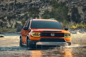 El Honda Passport destaca por su robustez y capacidad en terrenos difíciles. Ideal para aventuras familiares.