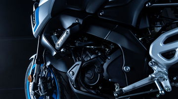 Imagen del motor de la Yamaha MT125, destacando su diseño moderno y funcional.