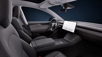 Interior del Tesla Model Y, con un diseño moderno y minimalista.