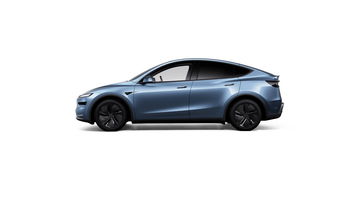 Vista lateral del Tesla Model Y 2025, destacando su diseño aerodinámico.