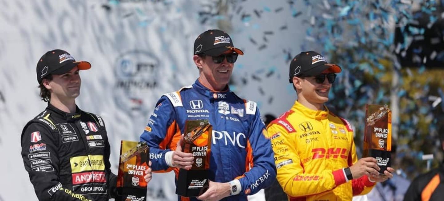 Pilotos celebrando en el podio del Gran Premio de Long Beach IndyCar 2024.